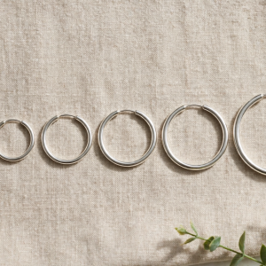 Illustrative styling image of hoop earrings