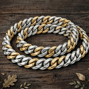 Illustrative two-tone men's bracelet with silver and gold links coiled on dark wood