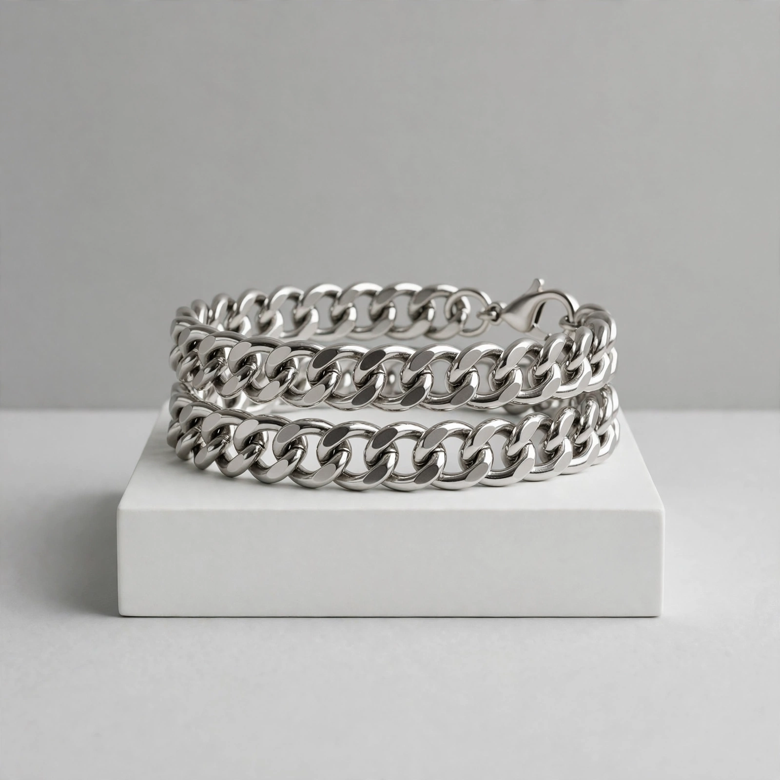 Illustrative styling image of layered chain anklets