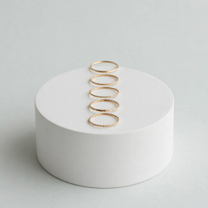 Illustrative styling image of a stackable ring set